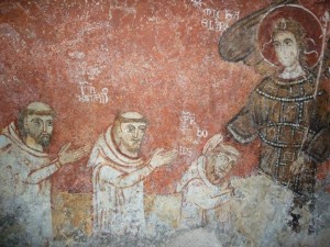 Part. di affresco con l'Arcangelo Michele e monaci in atto di devozione, Grotta di S. Michele, Olevano sul Tusciano (Salerno)